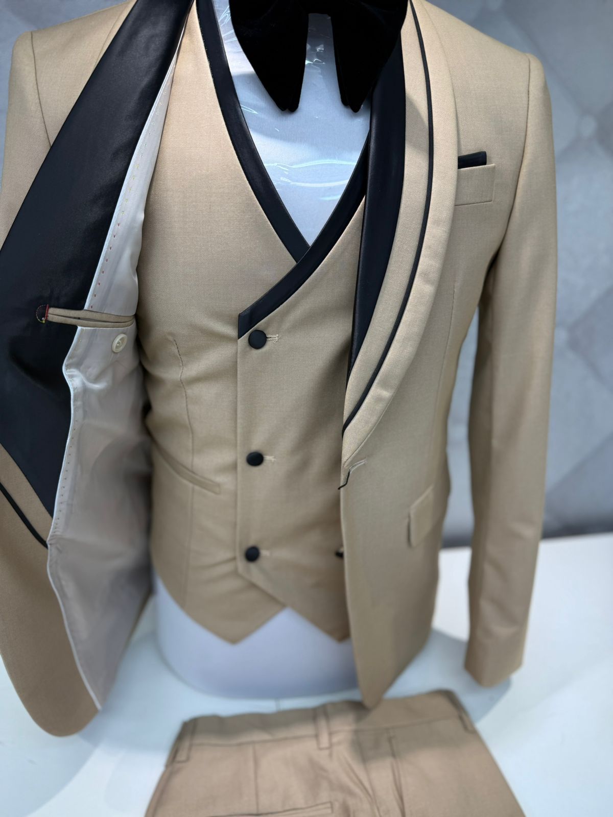 Elegant Beige Three-Piece Suit with Black Shawl Collar and Accents for Formal Occasions